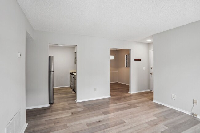 Living area view to kitchen and Dining room - 1813 Huntingdon Chase