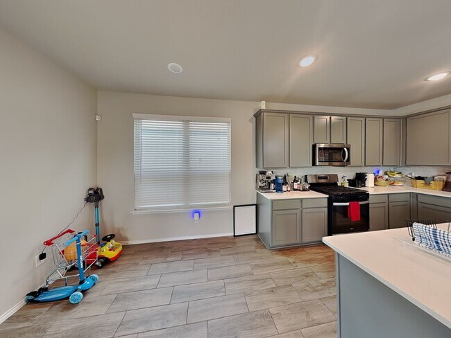 Building Photo - Modern Comfort Meets Spacious Corner-Lot Living