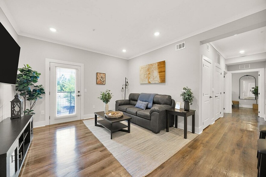 Pointe Grand Apartments Living Room - Beaufort (new)