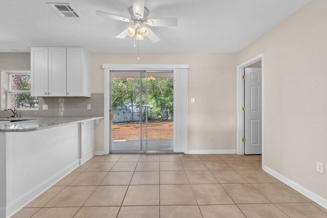 Building Photo - Updated Kitchen and Oversized Yard!