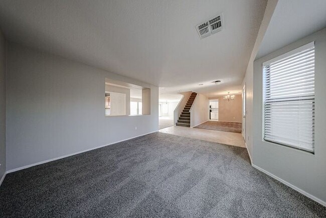 Building Photo - Introducing a stunning 4-bedroom, 2.5-bath...