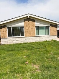 Building Photo - 5250 Jarvis Ave