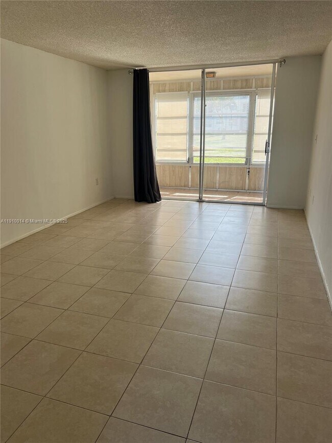 Building Photo - 8400 Sunrise Lakes Blvd