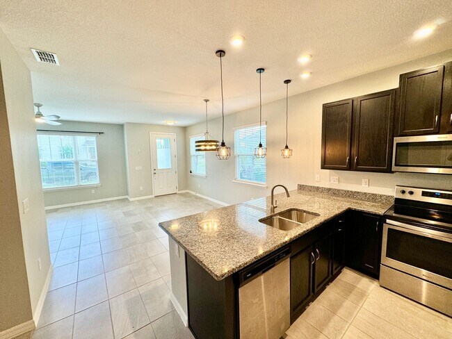 Building Photo - FOR RENT - Fantastic end unit townhouse in...