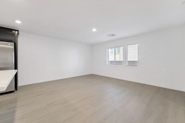 Building Photo - Modern Cadence Townhome with Sleek Finishes & Open-Concept Living!