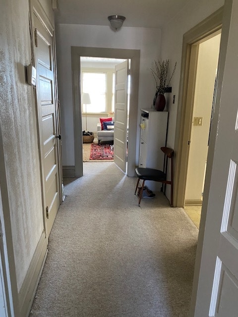 Hallway looking from bedroom towards living room - bathroom door on right - 1360 Denniston St
