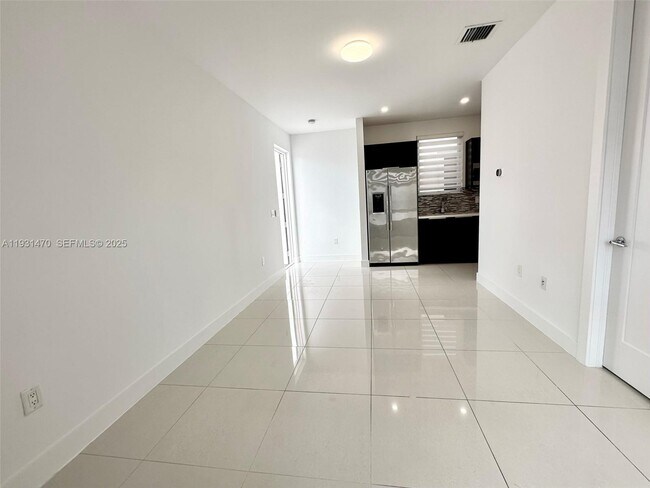 Building Photo - 6414 NW 104th Ct