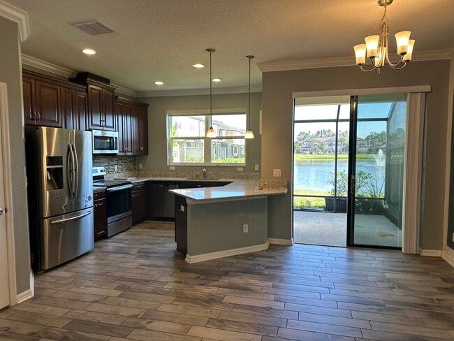 Building Photo - 9119 Carolina Wren Dr
