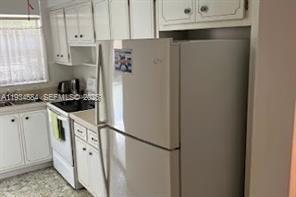 Building Photo - 201 NE 14th Ave