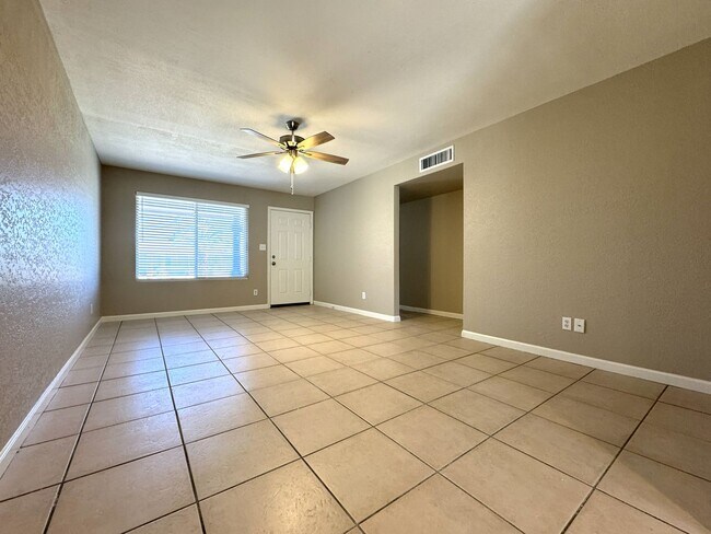 Building Photo - CORNER LOT 3 BEDROOM PLUS DEN WITH FIREPLACE AND LARGE YARD