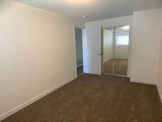 Building Photo - Three bedroom home with large yard| Available July!