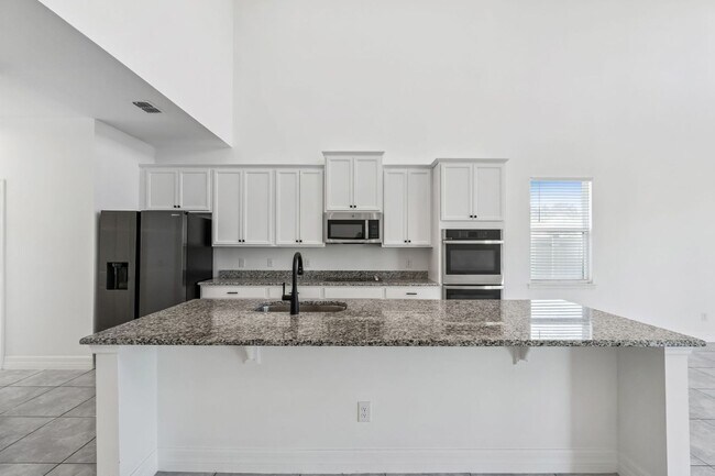 Building Photo - Amazing 5/3.5/2 House in The Reserve at Pine Tree