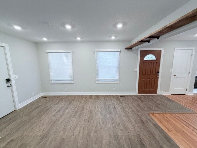 Building Photo - Spacious 4-Bedroom Home with Pond Views & EV-Ready Garage – Bloomington!!