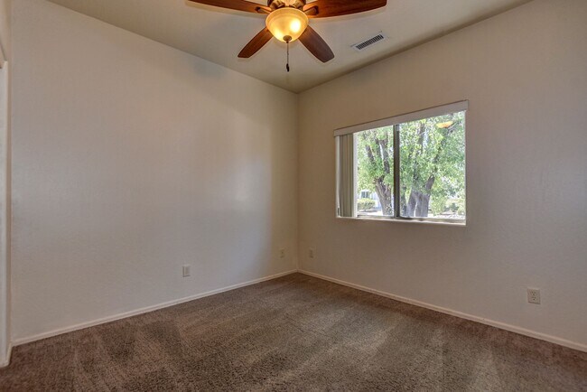 Building Photo - 5879 N Bronco Ln