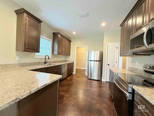 Building Photo - 33071 Stables Dr E