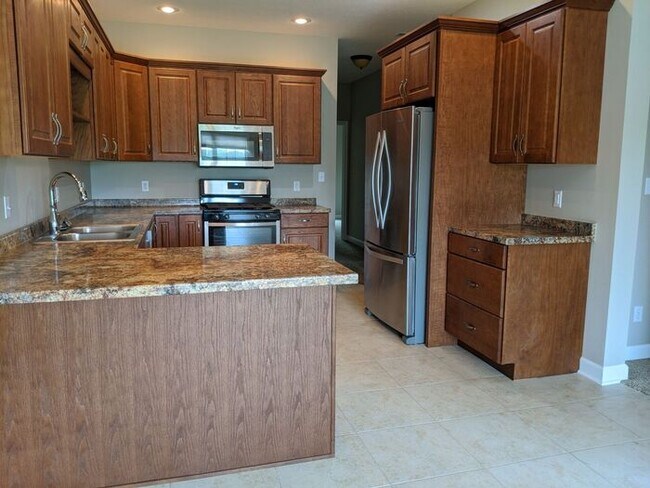 Building Photo - Step-free living with a wheelchair-accessible kitchen and primary bathroom, plus beautiful views ...
