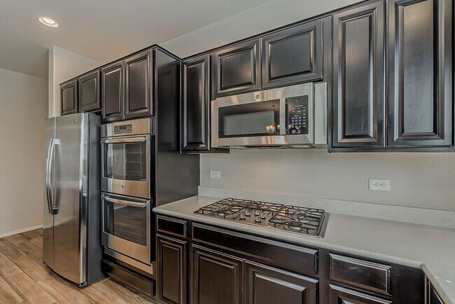 Building Photo - Modern 4 Bed Tucson Rental with Spacious K...