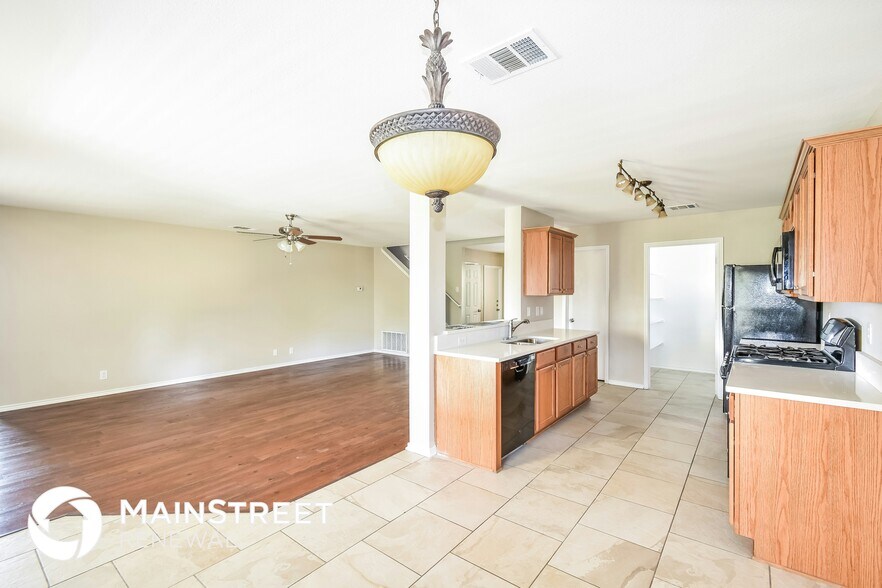 Building Photo - 8723 Trumpet Cir