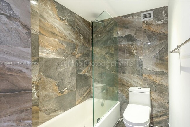 Building Photo - 6039 Collins Ave