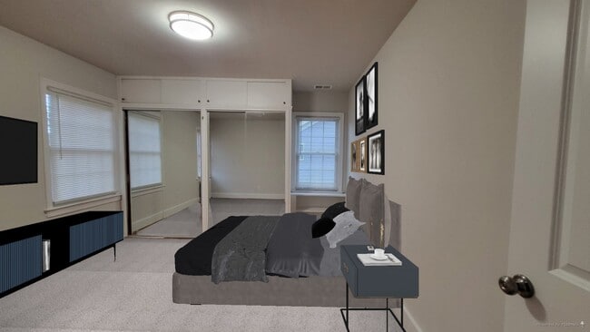 Upper-Level Front Bedroom - 5604 Madison St