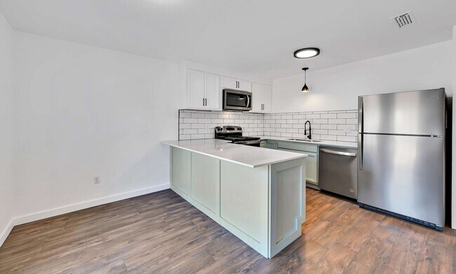 Building Photo - 5311 Tennyson Dr