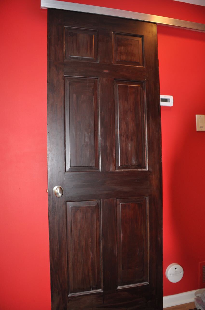 Barn door covering washer and dryer - 1203 Washington Ave