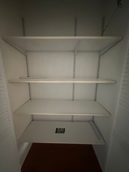 Hallway storage - 131 Country Club Dr