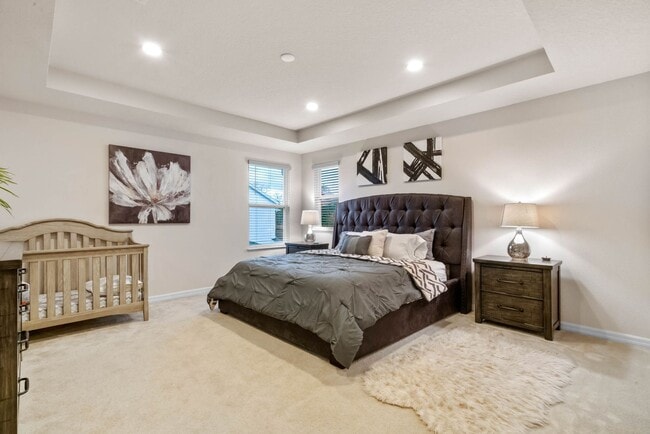 Building Photo - Water Front Home- 4 Large Bedrooms-3 baths Gated Community Call Sheila Campbell 407-687-7900