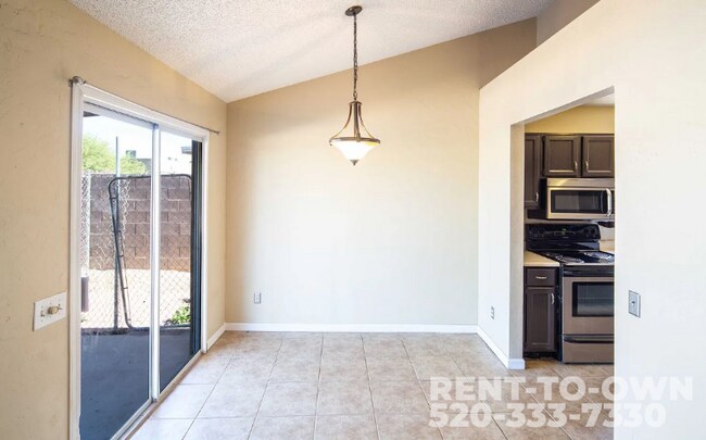 Building Photo - 8661 N Newhill Ave