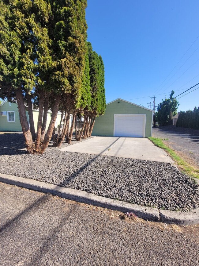 Building Photo - Free May rent with 1 Year Lease - Fully Remodeled with Garage & Yard Care Included