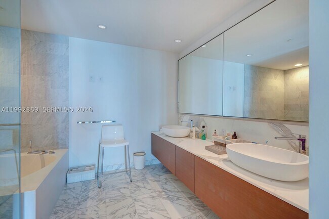 Building Photo - 10203 Collins Ave