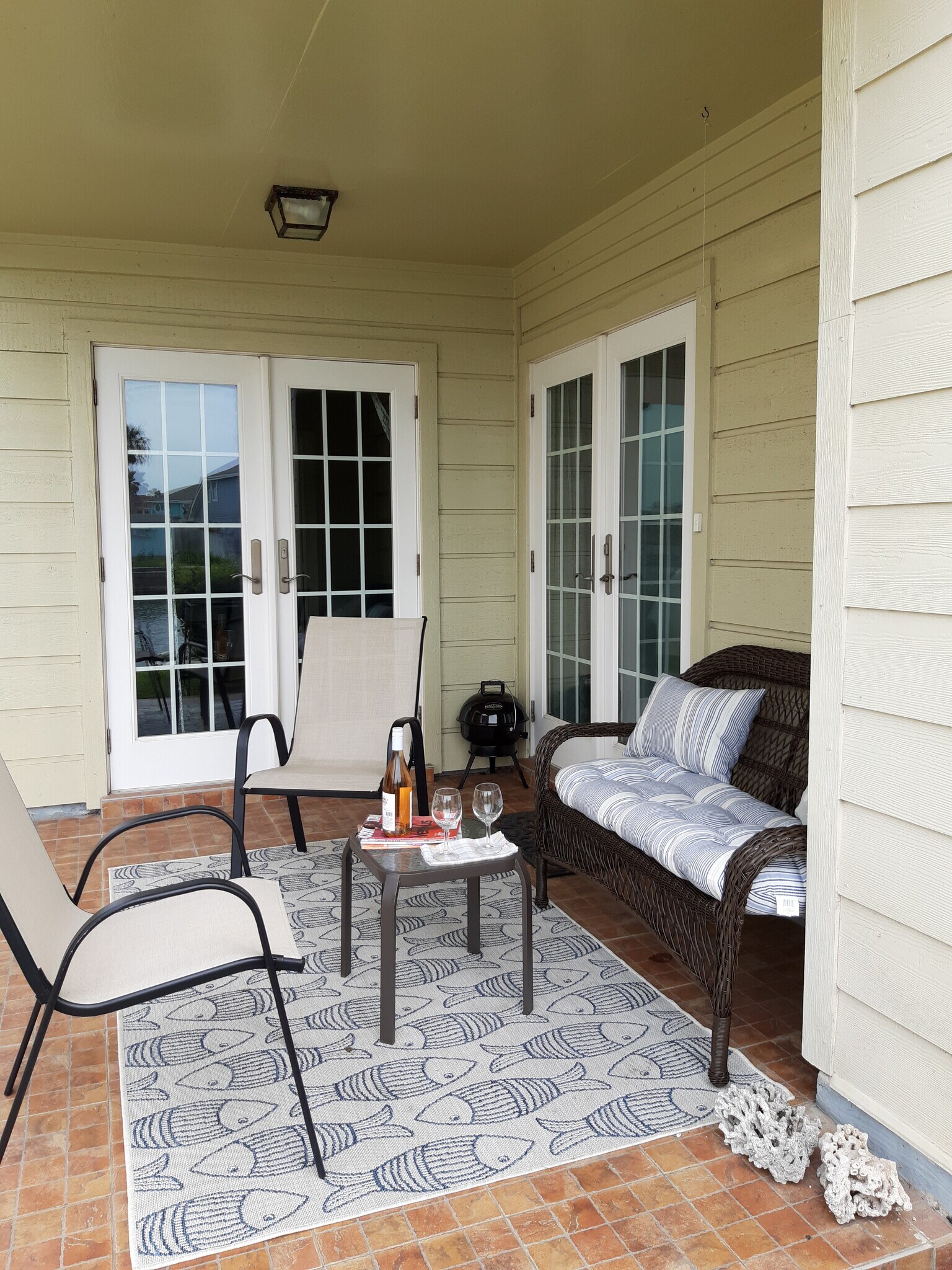 Patio on canal side. French doors to dining and bedroom 2 - 15421 Seamount Cay Ct