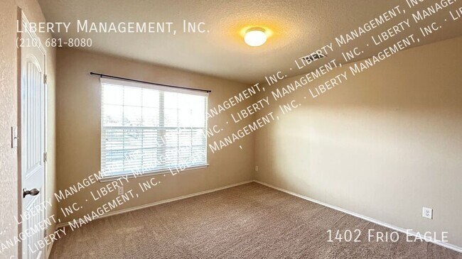 Building Photo - 1402 Frio Eagle