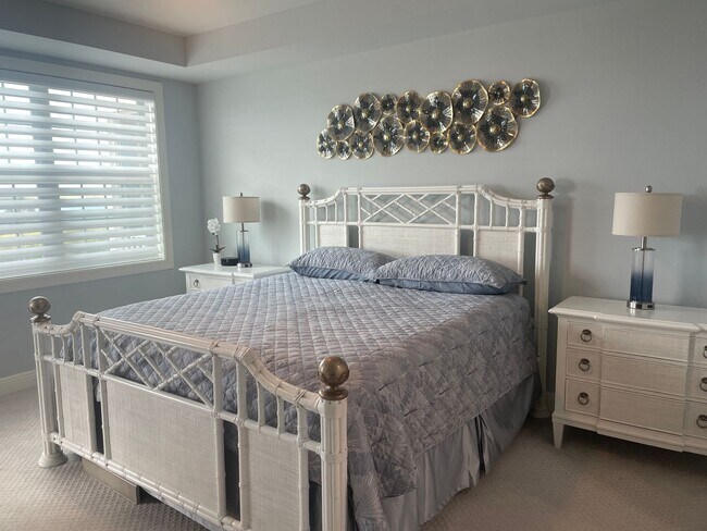 Building Photo - Coastal Luxury at Hidden Bay | 3BR Waterfront Condo with Bay Views