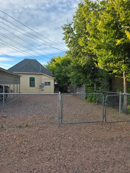 Backyard with off street parking area - 607 Harrison Ave