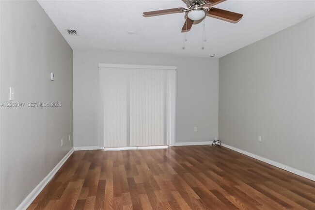 Building Photo - 9749 Sandalfoot Blvd