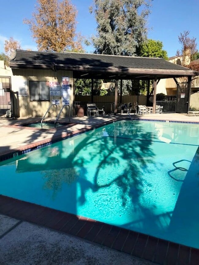 Building Photo - 3+2.5 w/pool + spa; water, trash + basic c...