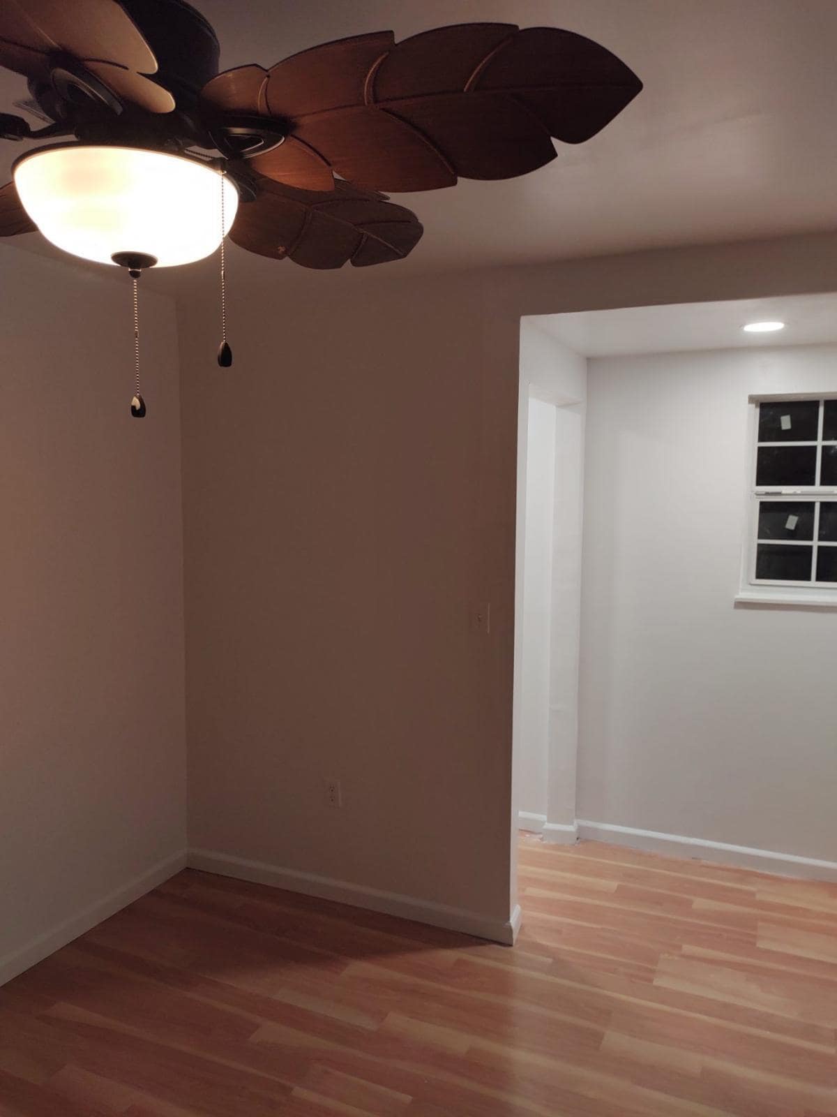 Bedroom 1 with large closet and ceiling fan. - 1819 Wells Station Rd