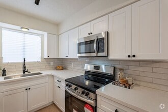 Building Photo - 2nd floor unit with all the upgrades!