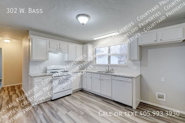 Building Photo - 302 W. Bass-