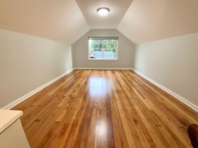 Building Photo - Beautiful Townhouse with Fenced Yard, Garage, and AC