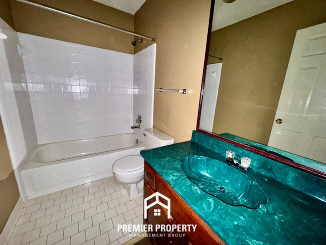 Building Photo - Spacious 3BR/2BA Near Southwind | 1,958 Sq Ft, Brick Fireplace, 2-Car Garage & Quiet Cove