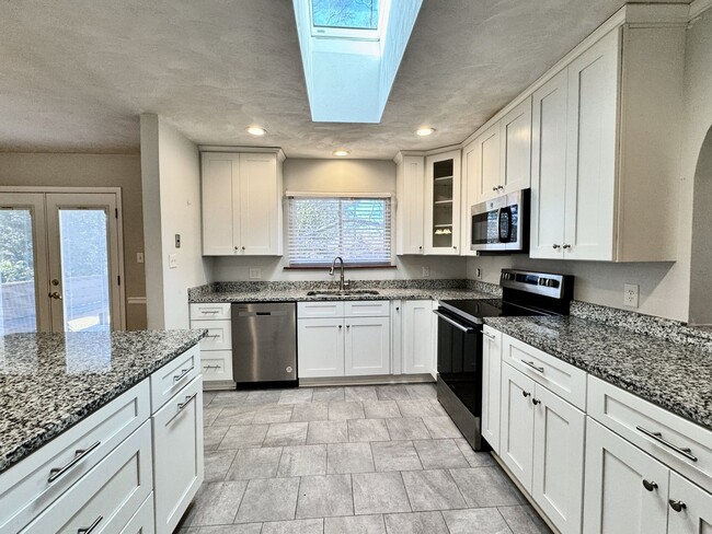 Building Photo - Available NOW! Lakefront 4 Bedroom/2 Bath Home, Pet-Friendly, Fenced Yard, Great School Zones!