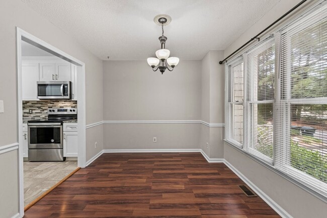 Building Photo - Updated and Adorable!  2 Bedroom Townhome in N/E Raleigh near REX, Glenwood, & Crabtree - Pet Fri...