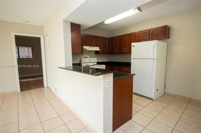 Building Photo - 9491 Palm Cir S