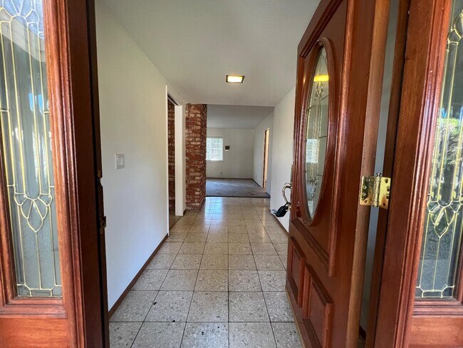 Building Photo - 6484 Camelia Dr