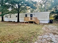 Building Photo - Adorable 2 bedroom 2 bath Trailer Home loc...