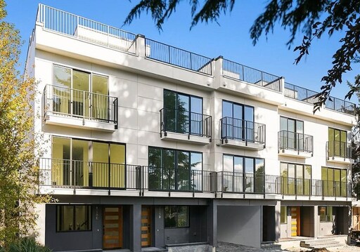 Building Photo - Modern 3-Bedroom End-Unit Townhome with Pr...