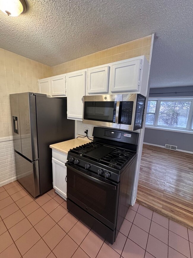 Building Photo - AVAILABLE NOW - Nicely rehabbed 3 Bedroom Single Family Home with Garage and Very Large Backyard