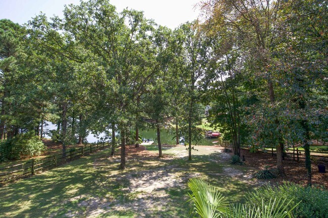 Building Photo - Coming up in September!!!!!Lakefront oasis...